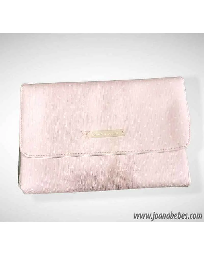 Pasito cambiador rosa con topitos blancos