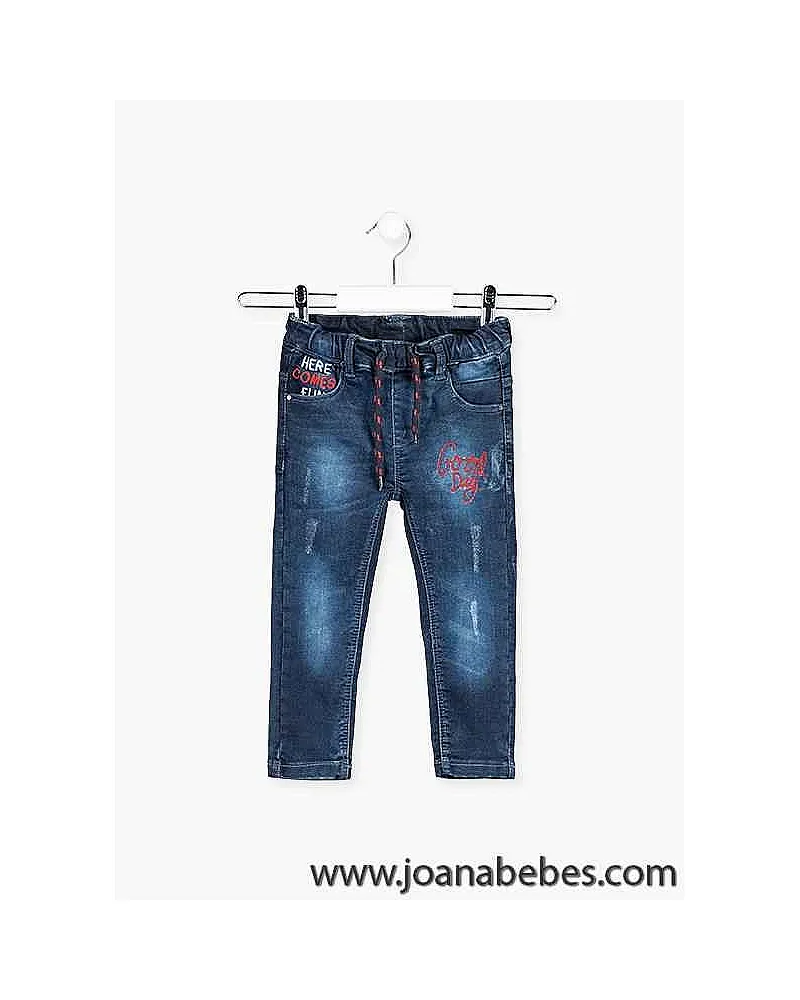 Pantalón de efecto vaquero de corte pitillo con bordados.